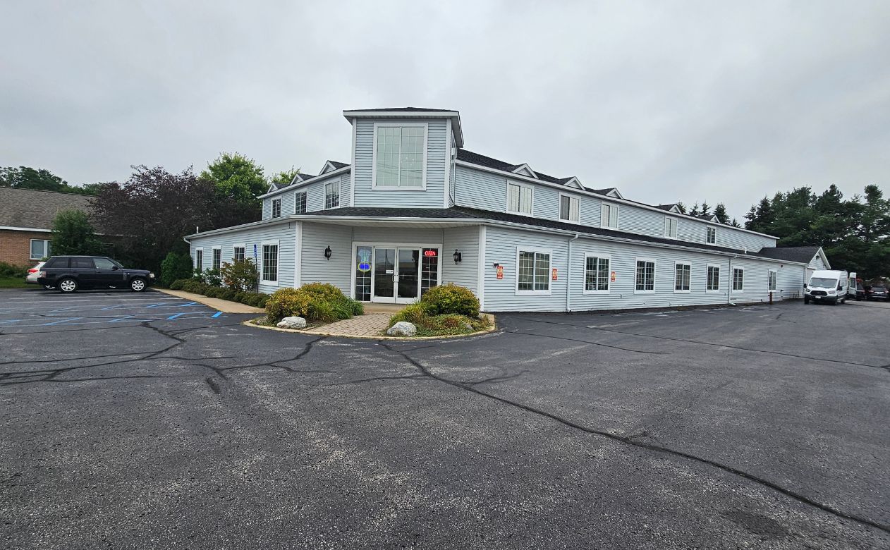 Bartletts' Home Interiors showroom in Charlevoix, MI exterior in 