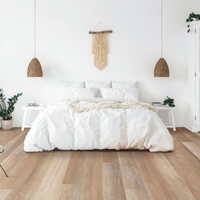 luxury vinyl installation in a bedroom in Charlevoix MI